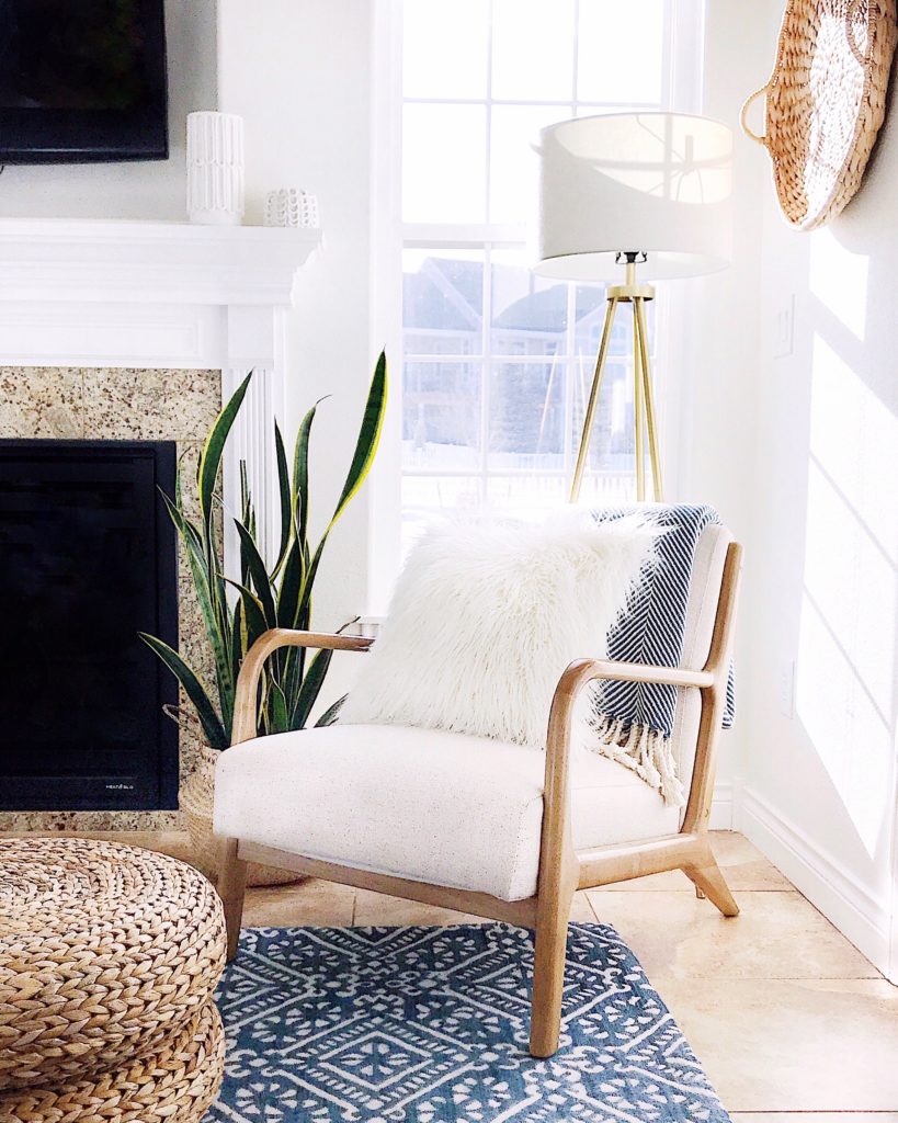 Our small living room with a fireplace and mid-century modern chair - jane at home - living room decor - living room furniture - living room table - coastal decor - coastal living room - coastal grandmother - coastal grandma - boho style - boho living room - modern coastal decor -hearth room