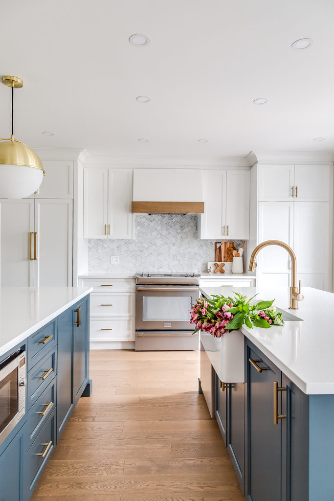 A beautiful blue and white kitchen design with brass finishes - Hibou Design Co
