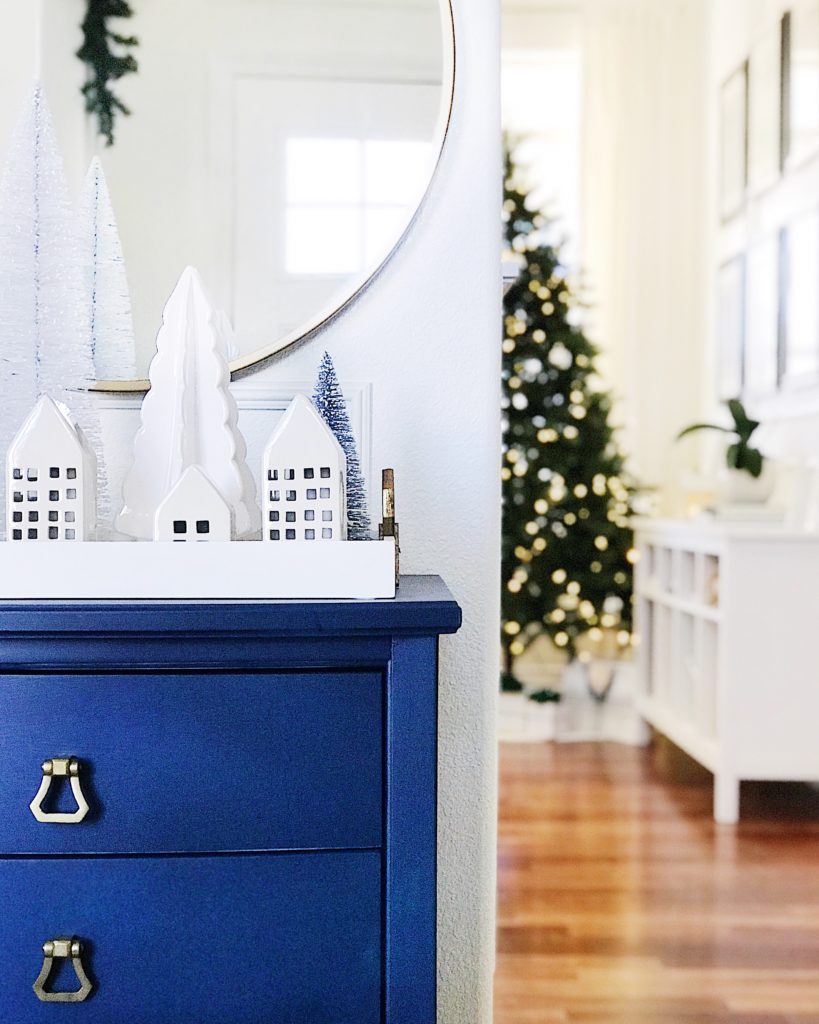 Easy blue and white Christmas decorating ideas - tiny houses and trees in the entryway