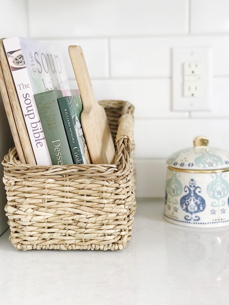 Winter decorating ideas - cookbook basket in the kitchen for storage and organization - jane at home