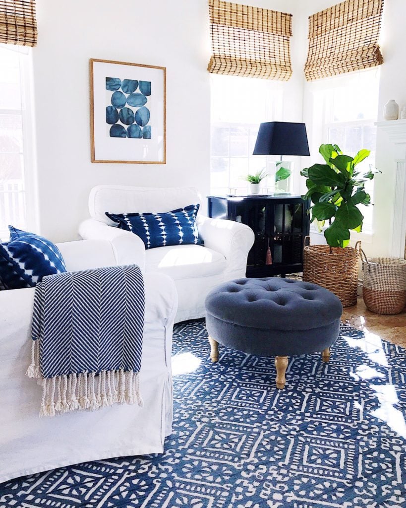 Blue and white modern living room with coastal boho style - decorating with blue and white in the family room - Jane at Home #homedecor #livingroomideas #livingroomdecor