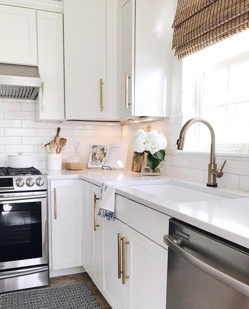 White kitchen cabinets with gold accents - jane at home #kichen #homedecor #hydrangeas