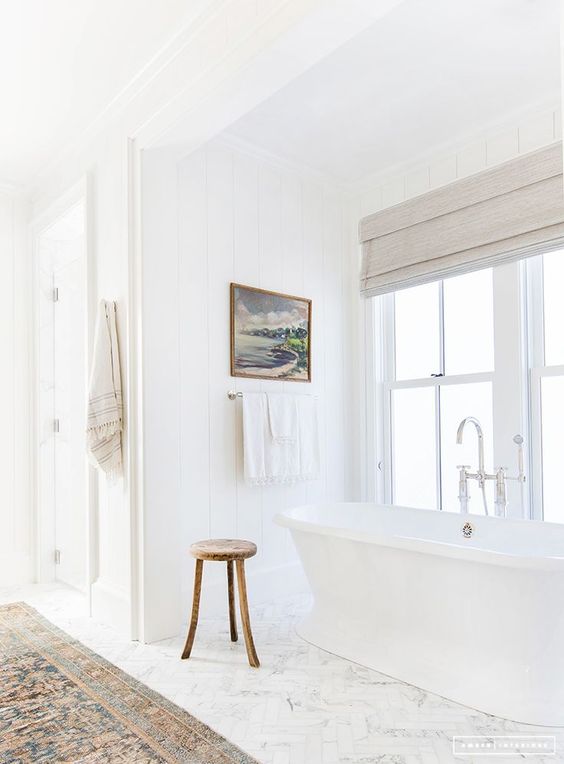 Love this beautiful master bathroom with a freestanding tub and vintage rug - bathroom ideas - bathroom remodel - bathroom decor 