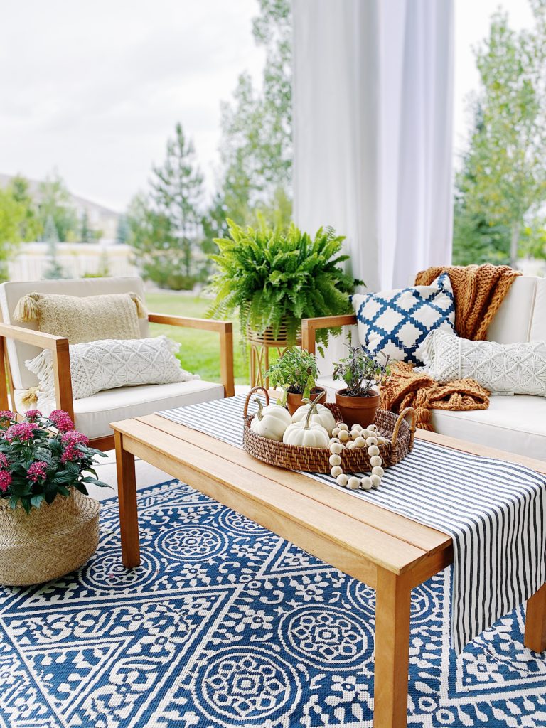How to decorate your home and patio for fall with blue - jane at home #falldecor #bluedecor #coastaldecor #falldecoratingideas #coastalstyle #porch #fallporch