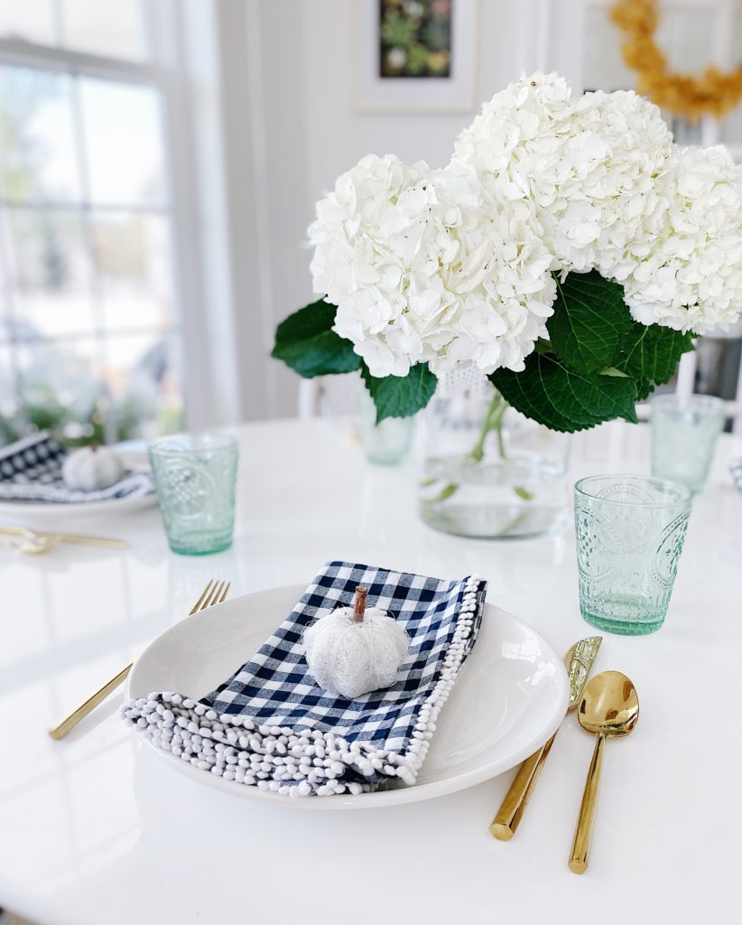Blue fall decor: how to decorate your home for fall with blue - jane at home #falldecor #bluedecor #coastaldecor #falldecoratingideas #coastalstyle #falltable #falltabledecor
