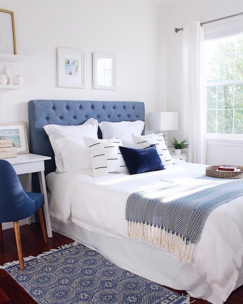 Loving how light and bright our guest bedroom feels since we painted the walls and ceilings white, using White Dove by Benjamin Moore - jane at home #bedroom #decor #home #style #ideas #paint #palette #white #blue