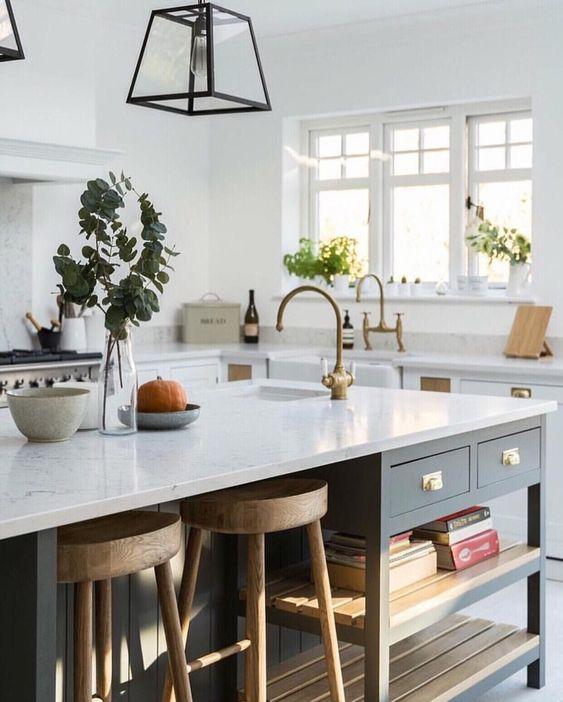 Love this beautiful kitchen design with white cabinets and a custom kitchen island - shaker kitchen cabinet company