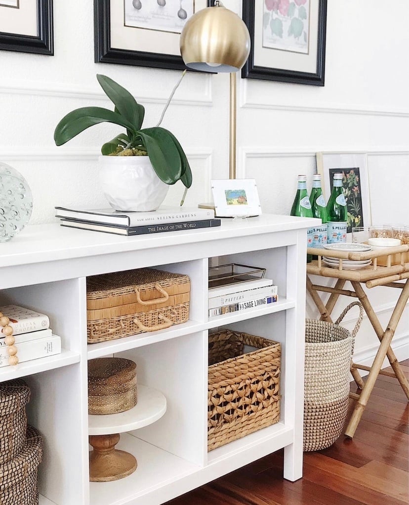 I love using baskets to make our home feel fresh for summer #livingroomdecor #shelfdecor #organization