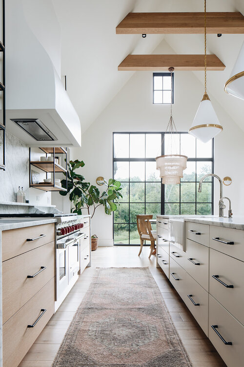 Gorgeous modern kitchen design with vaulted ceilings and abundant natural light; design by Kate Marker Interiors – Hickory Project