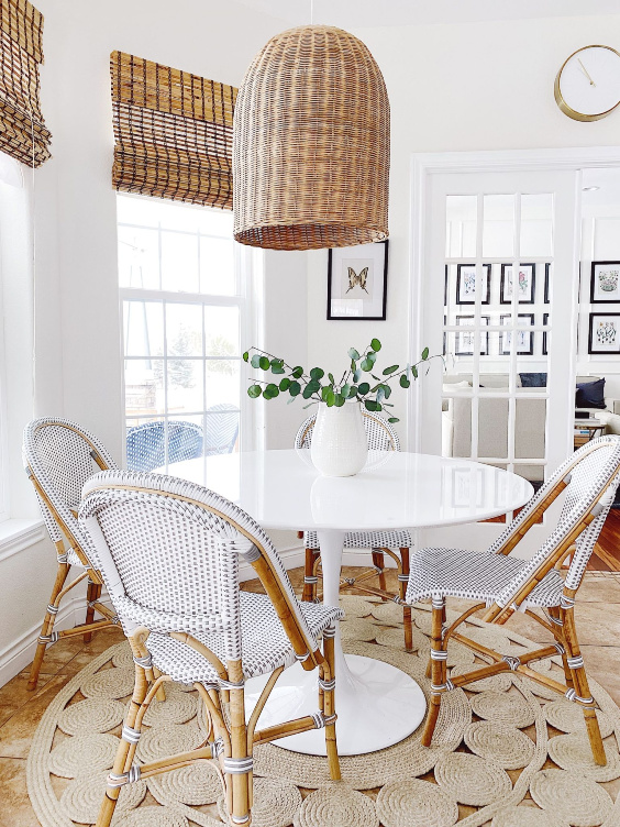 Spring favorites in the kitchen dining nook ith Riviera chairs and Santa Barbara pendant light - jane at home
