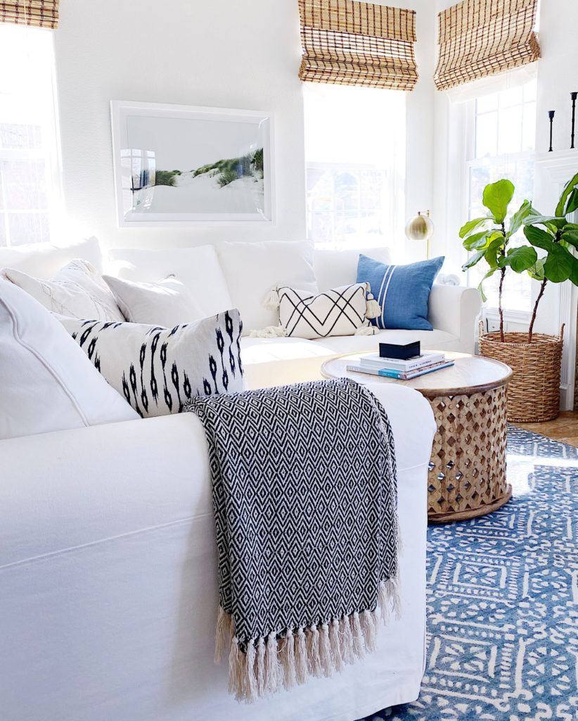 Our hearth room, or keeping room, is decorated with crisp blues and whites, making it our favorite place to hang out! jane at home - living room ideas - modern coastal decor