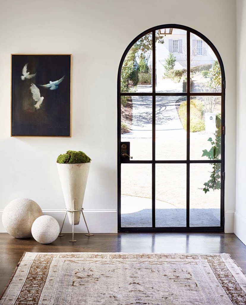 Beautiful modern entryway with stunning glass arched doorway - kristan and co. #entry #foyer #entrywaydecor #doorway