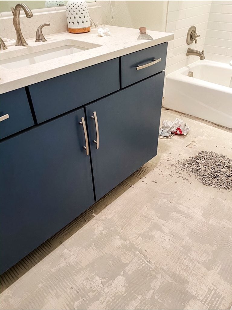 Our budget guest bathroom remodel, including how to paint bathroom cabinets - freshen up your bathroom with easy and budget friendly diy bathroom remodeling tips ... with bathroom design and decor ideas to match any style of interior - Benjamin Moore Van Deusen Blue #bathroom #bluebathroom #bathroomremodel