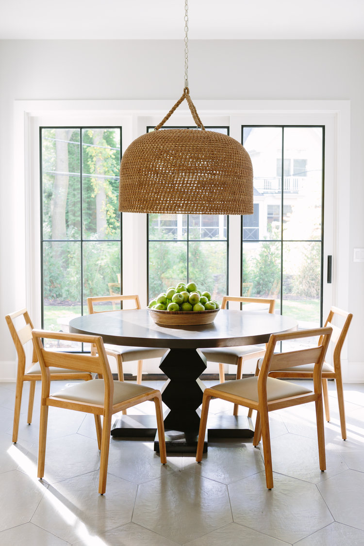 Dining Area | Breakfast Nook Idea | Woven Light | Round Table | Modern Chairs | Light Woods | Brynn Olson | #interiordesign #dining #lighting