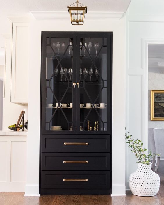 This stylish china cabinet is fitted into what used to be an opening to a hallway! from chelsea horsley design