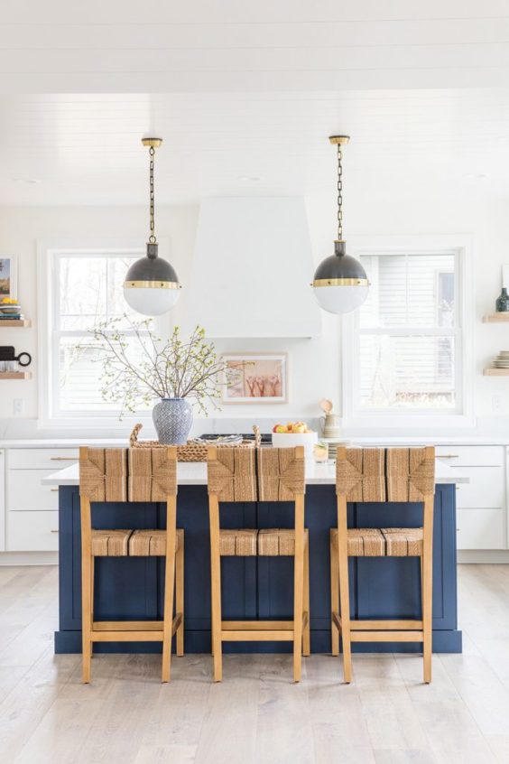 Such a gorgeous kitchen!  The deep blue island color is a beautiful contrast to the all white cabinets and walls. kitchen remodel - white kitchen - modern kitchen - kitchen ideas - blue kitchen