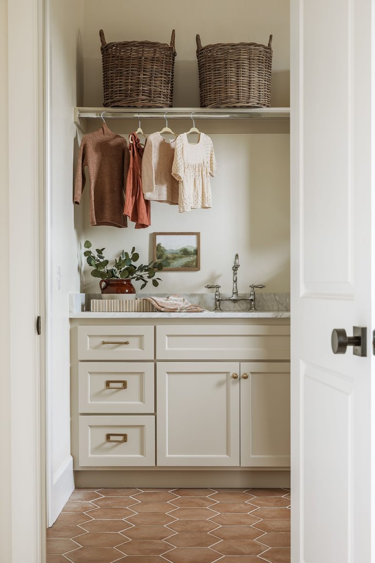 Such a sweet view of this beautiful laundry room! laundry room ideas 