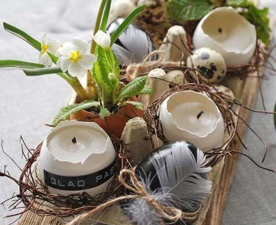 Easy spring and Easter table setting ideas, table scapes, spring table decor, and centerpiece ideas for Easter brunch or dinner - eggs filled with tiny plants and candles on a wooden board - jane at home
