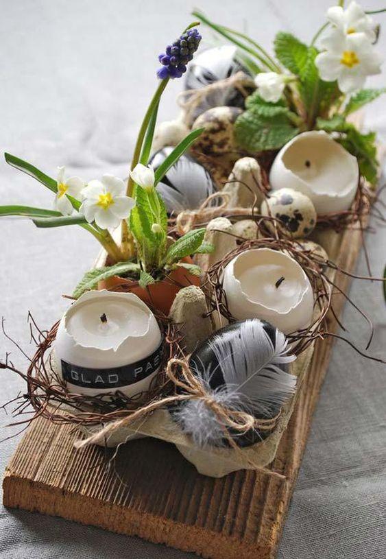 Easy spring and Easter table setting ideas, table scapes, spring table decor, and centerpiece ideas for Easter brunch or dinner - eggs filled with tiny plants and candles on a wooden board - jane at home