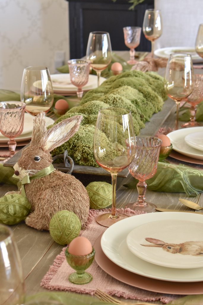 I love this beautiful spring and Easter tablescape, with its rustic wood dough bowl and soft green and blush color scheme. spring table - easter table - spring decorating ideas