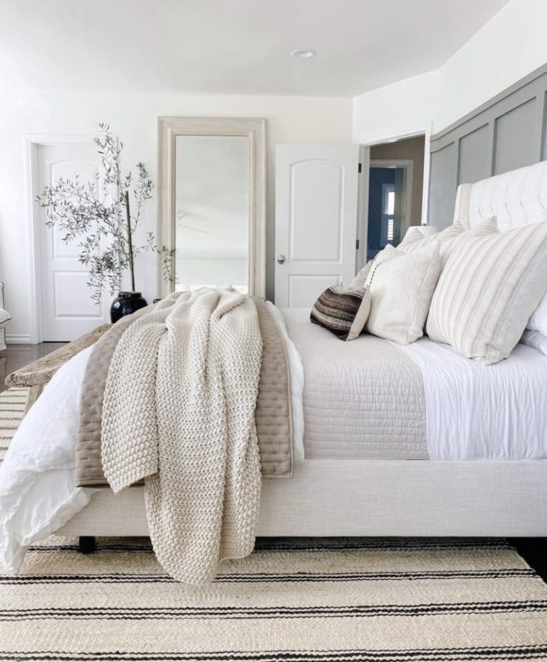 Love this beautiful bedroom design with layered bedding and light neutral decor and furniture - bedroom ideas - bedroom decor - bedroom ideas - master bedroom - modern coastal bedroom - coastal cowgirl - the heart and haven