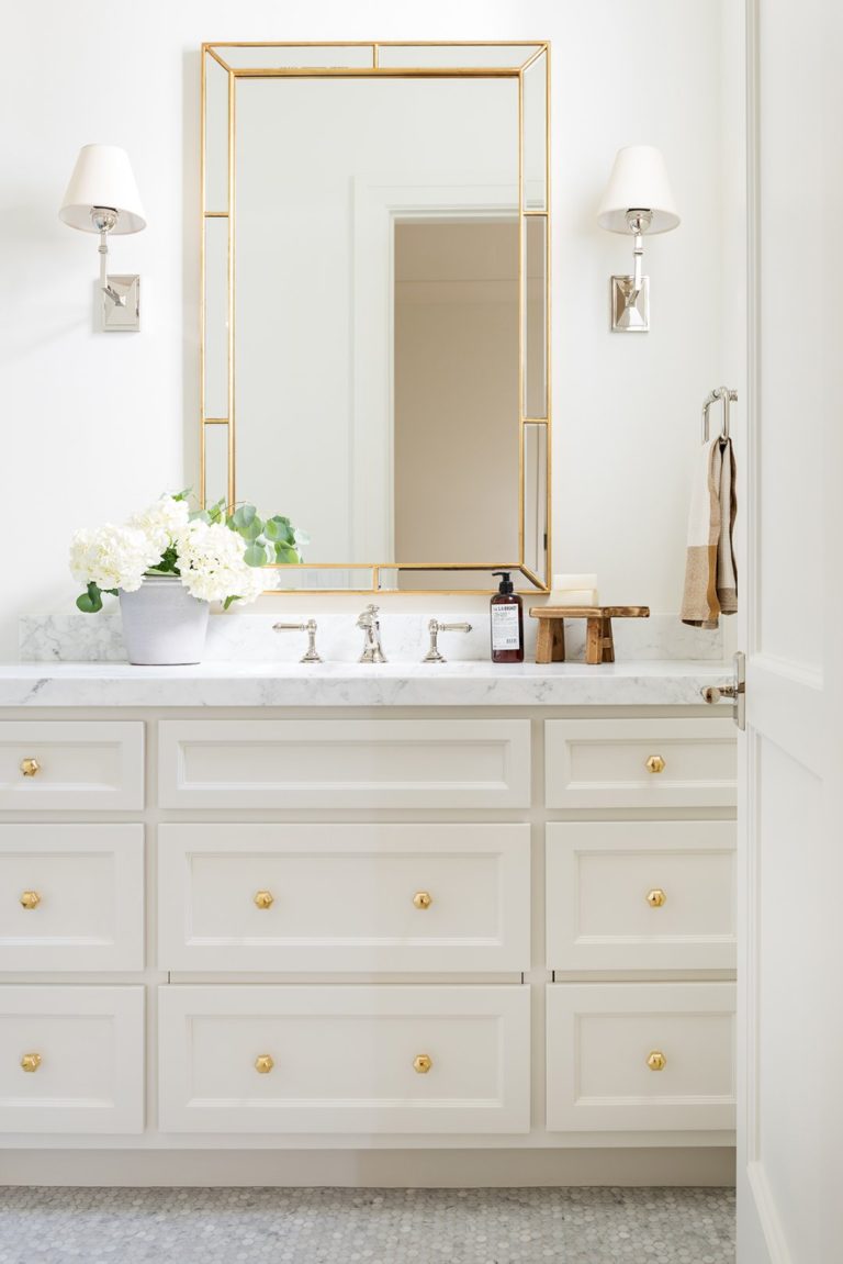 Beautiful master bathroom design with a mix of chrome, polished nickel and brass metal finishes