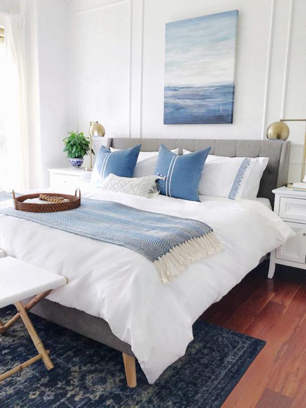 Calming blue and white master bedroom for summer - jane at home #bedroomdecor #bedroomdesign #bedroomideas #coastaldecor #bluedecor #blueandwhite