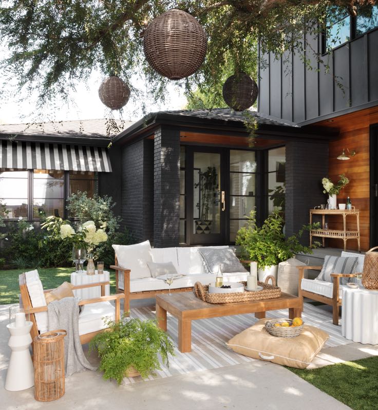 Beautiful backyard patio and outdoor living area with modern furniture, lighting, and decor - studio life style - serena and lily