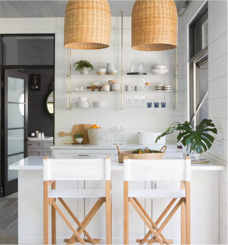 Beautiful kitchen counter stools and lighting with a beach house feel