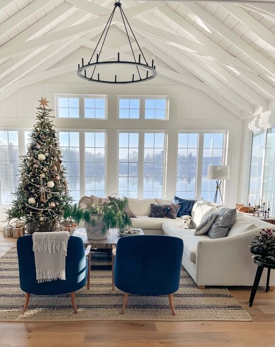 Love this beautiful lake house living room decorated for Christmas! the lily pad cottage - living room ideas - living room decor - Christmas decor ideas - Christmas decorations