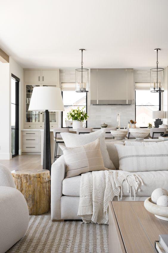 Love this beautiful transitional living room and home with a white sofa, wood coffee table, and neutral furniture and decor - living room ideas - living room decor - transitional living room - cozy living room - studio mcgee