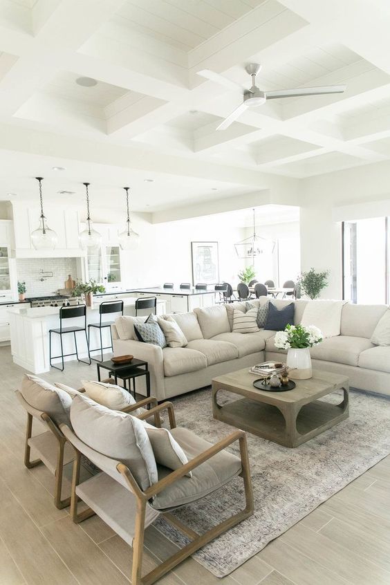 Love this beautiful modern living room with neutral decor and furniture and a wood coffee table - living room ideas - living room decor - living room table - living room furniture - modern farmhouse living room - organic modern living room