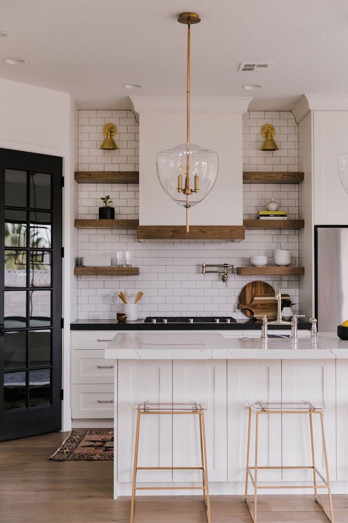 Love this beautiful modern farmhouse kitchen design with white cabinets, open shelving, and subway tile backsplash - becki owens