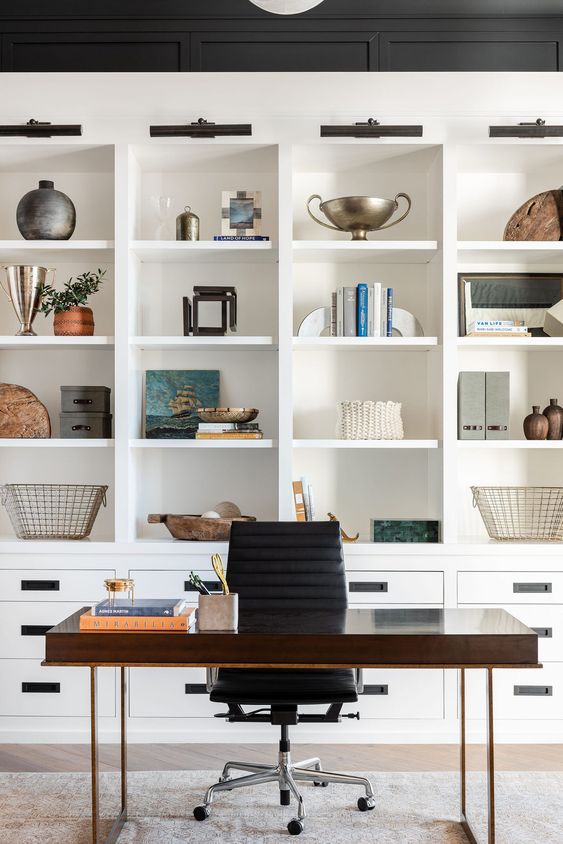 Beautiful home office and work space with built in shelving and cabinets - studio mcgee