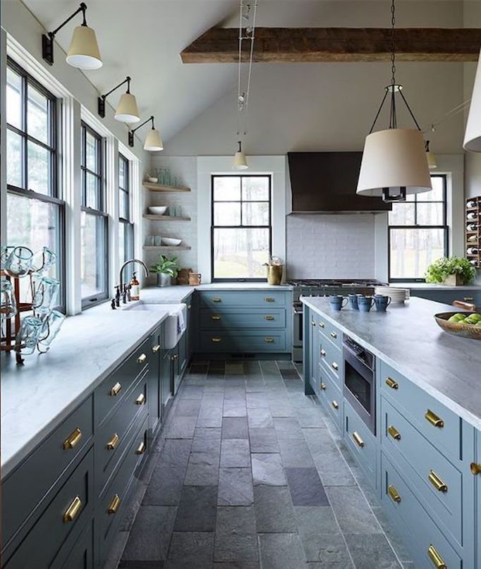 Love this beautiful kitchen design with green cabinets and a vintage Turkish Oushak rug - kristina crestin