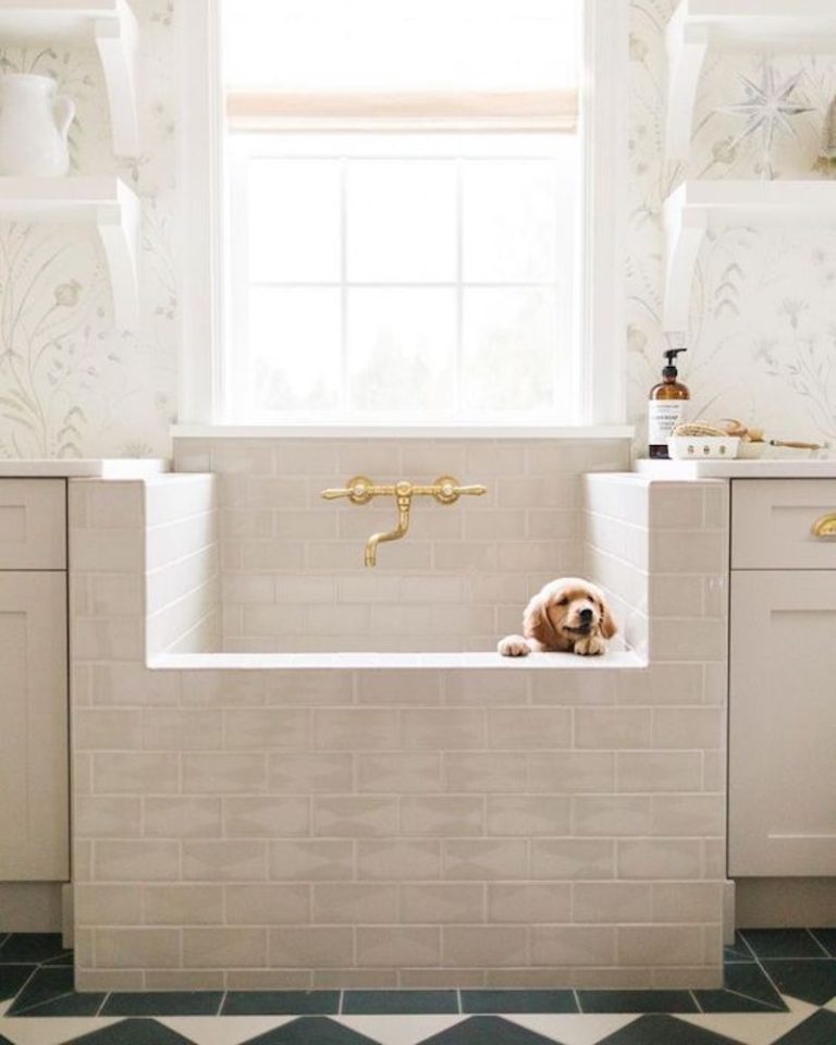 A sweet pup and dog bath in this beautiful laundry room and pet bathing area from Monika Hibbs