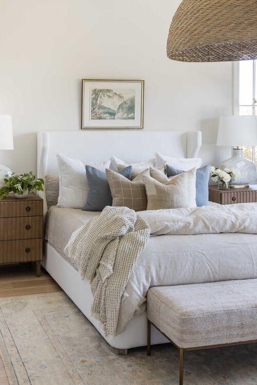 Love this beautiful bedroom design with layered bedding and neutral decor and furniture - bedroom ideas - bedroom decor - coastal decor - coastal cowgirl - pure salt interiors