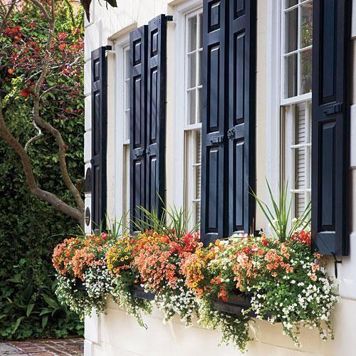 Beautiful fall porch ideas, with fall decor and inspiration to bring a welcoming modern touch of autumn to your front porch, patio, and home - fall decor ideas for the home - fall house - window box - fall wreaths - farmhouse fall decor