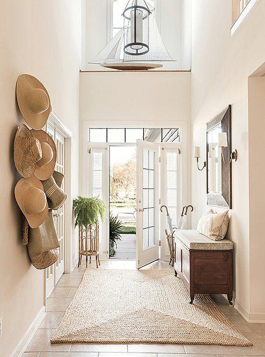 Make a beautiful first impression with modern entryway ideas, foyer decor, lighting, rugs, art, storage, ideas for small entryways, design tips and more - matthew caughy