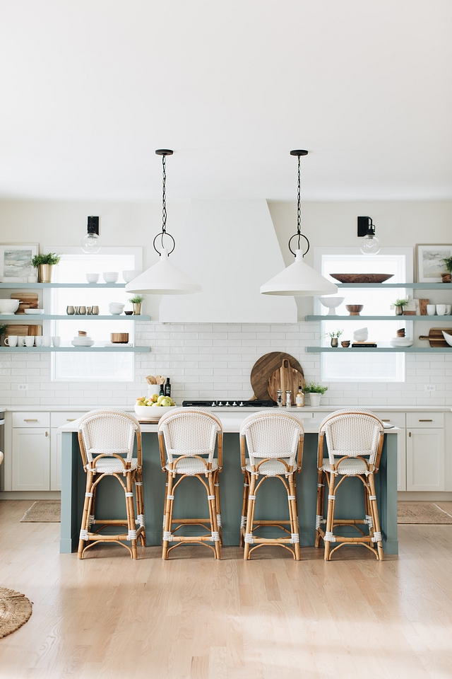 Love this beautiful modern coastal kitchen design with woven counter stools and a blue island - timber trails - julie howard - kitchen ideas - kitchen decor - kitchen remodel