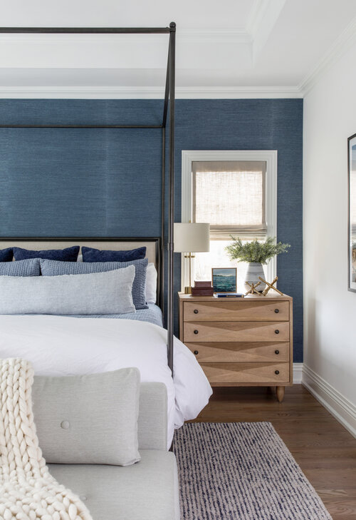 Love this beautiful modern master bedroom with a dark blue accent wall and soft neutral bedding, furniture, and decor - bedroom ideas - bedroom furniture - bedroom decor - bedroom wall ideas - coastal bedroom - coastal decor - coastal grandmother - salt design co.