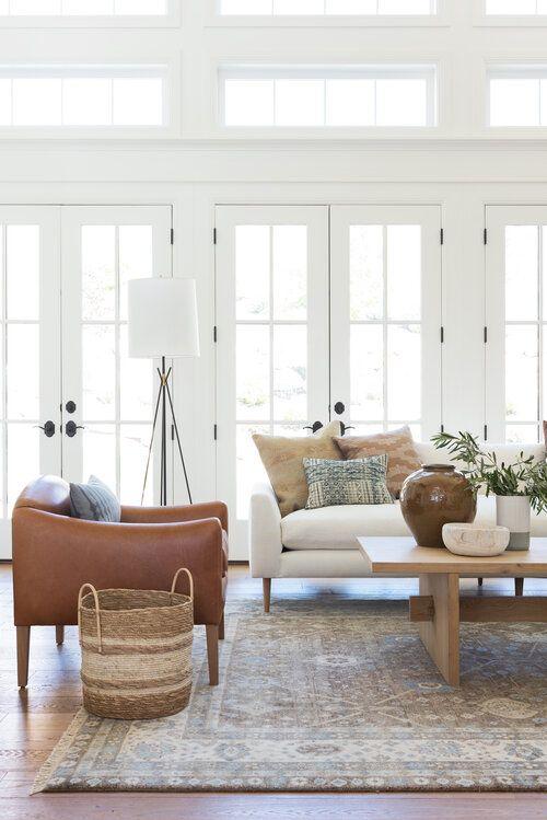 Love this beautiful living room design with a white sofa, wood coffee table and neutral decor and furniture - living room ideas - living room decor - living room inspo - coastal cowgirl - studio mcgee