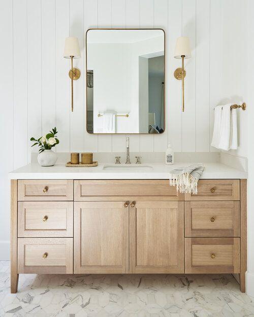 Love this beautiful modern master bathroom with a light oak wood vanity cabinet and a mix of brass and polished nickel finishes - bathroom remodel - bathroom ideas - michelle d young