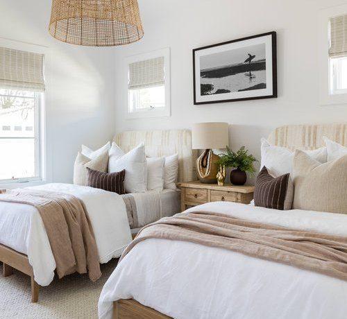 Love this beautiful bedroom idea with two beds, a woven light fixture, and neutral decor and furniture - guest bedroom ideas - guest bedroom decor - guest room - coastal bedroom - coastal decor