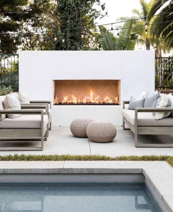 Love this beautiful modern outdoor living and seating area and fireplace - patio decor - patio ideas - patio furniture - outdoor ideas - pure salt interiors -