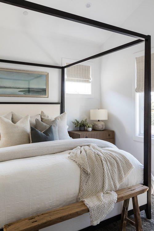 A beautiful coastal bedroom design with neutral decor and furniture - coastal grandmother bedroom ideas