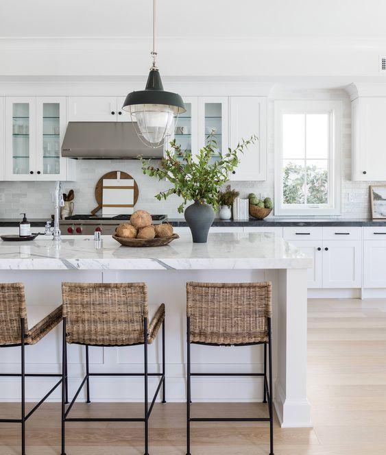 Love this beautiful kitchen design with woven counter stools and black pendant lights - kitchen ideas - white kitchens - pure salt interiors