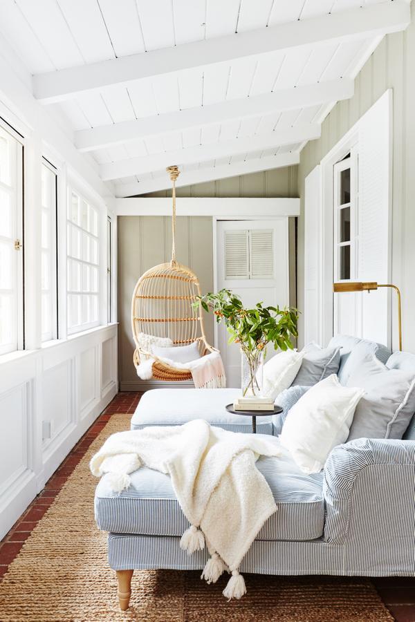 Love this gorgeous sunroom with its hanging swing chair and double chaise lounges - outdoor ideas - enclosed porch - screened porch - sun room - covered patio - covered porch - banner day