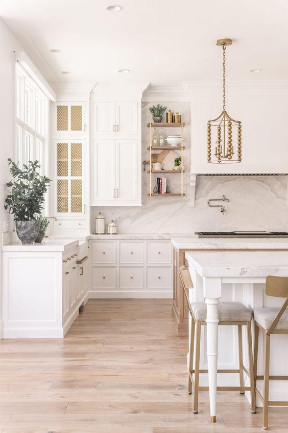 Love this beautiful timeless kitchen design with white cabinets and a white oak island - cs cabinetry