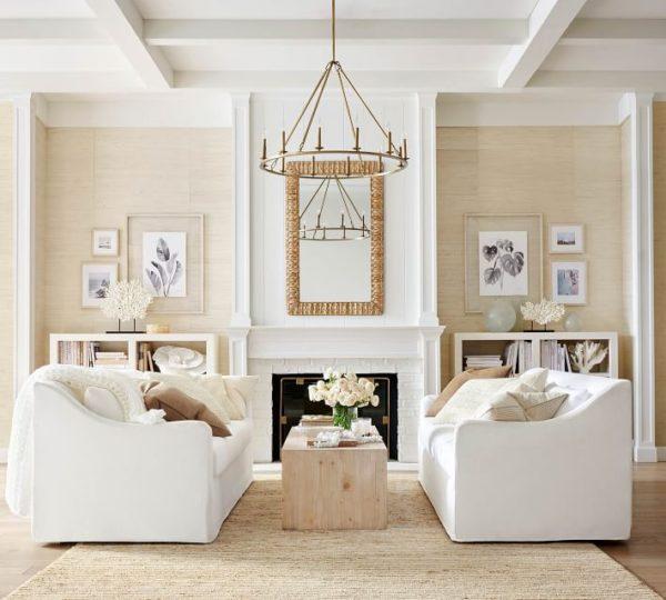 Beautiful living room with two sofas and natural area rug - pottery barn